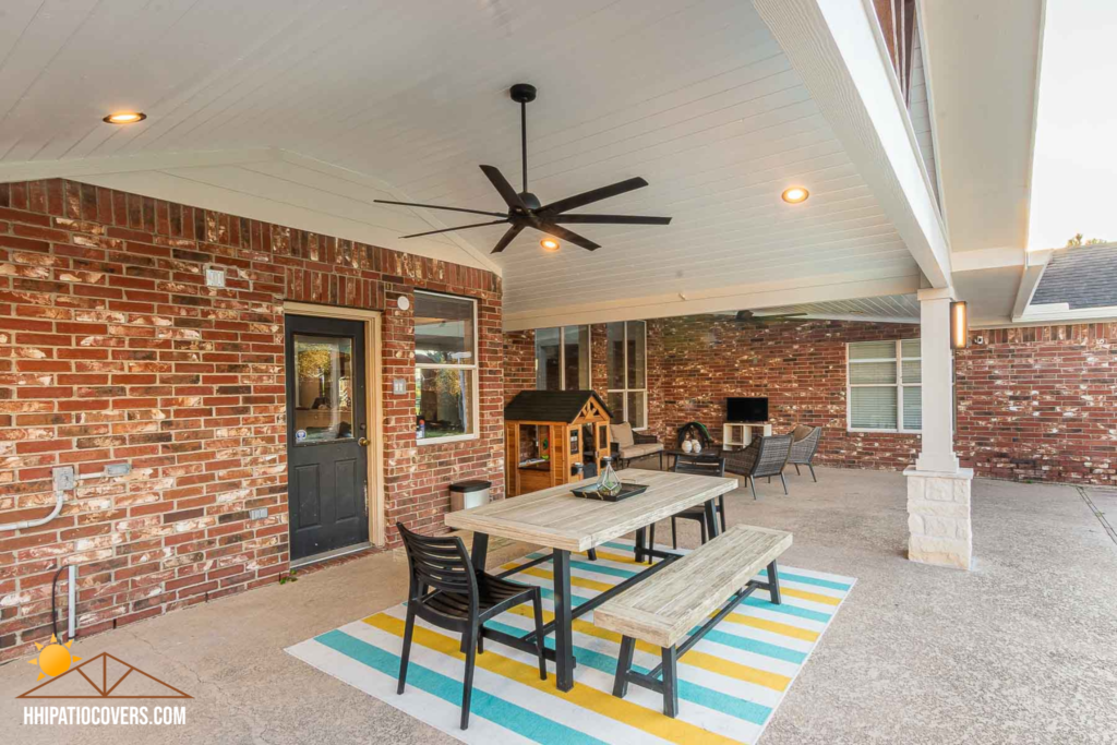 Gable style patio cover with hip-extension