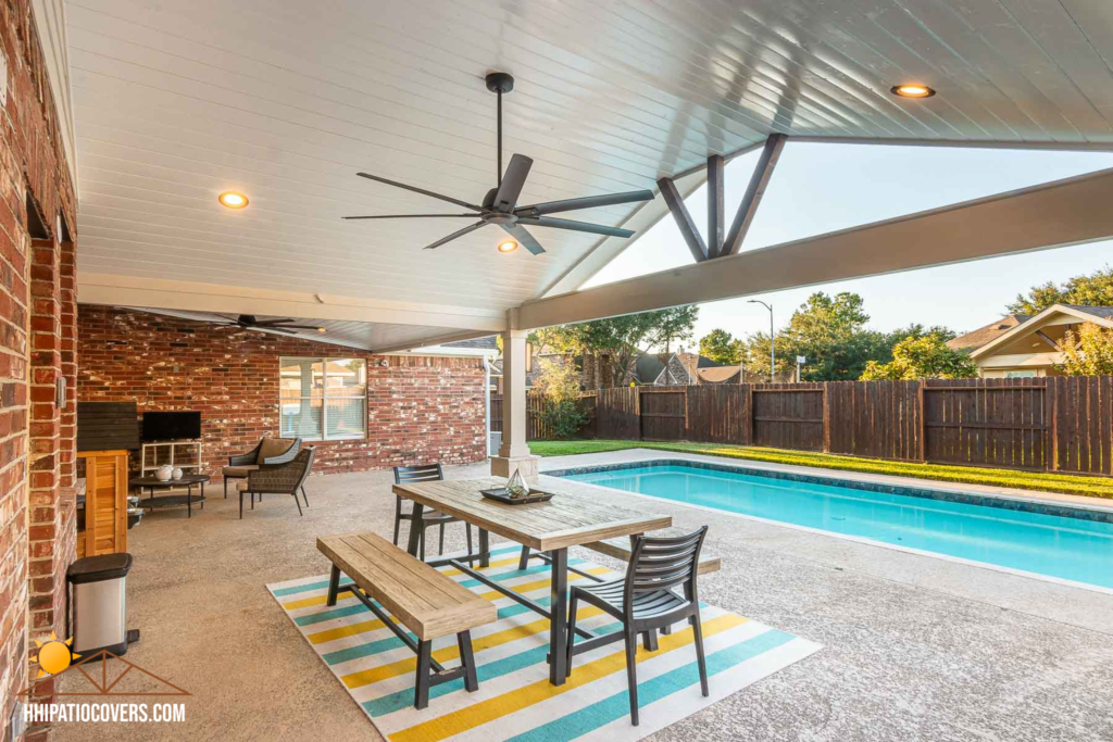 Gable style patio cover with hip-extension