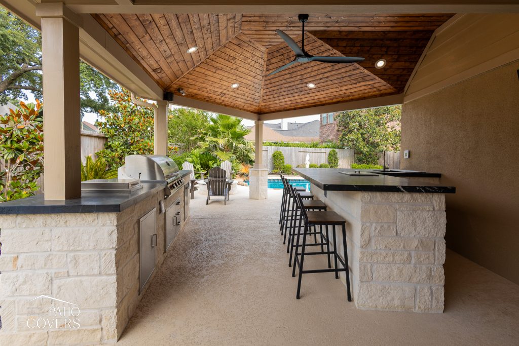 custom outdoor kitchen and bar area
