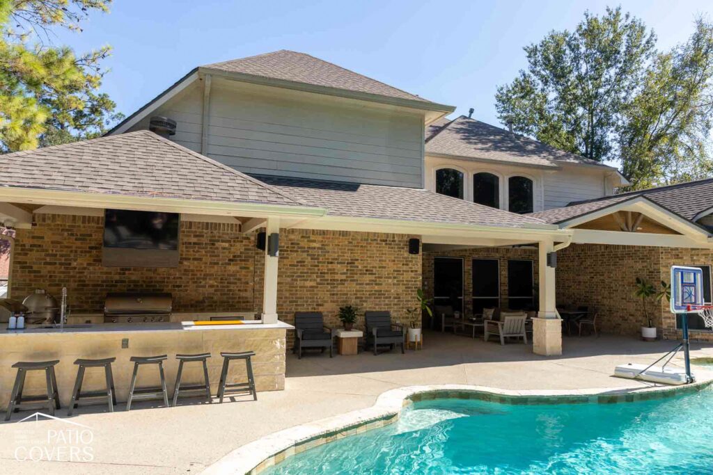 Hip-style patio cover with  gable extension